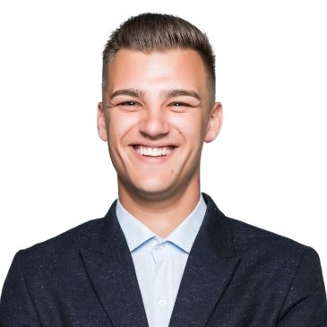 demo-attachment-3957-pretty-young-man-student-businessman-jacket-holds-his-arms-crossed-isolated-light-grey-wall